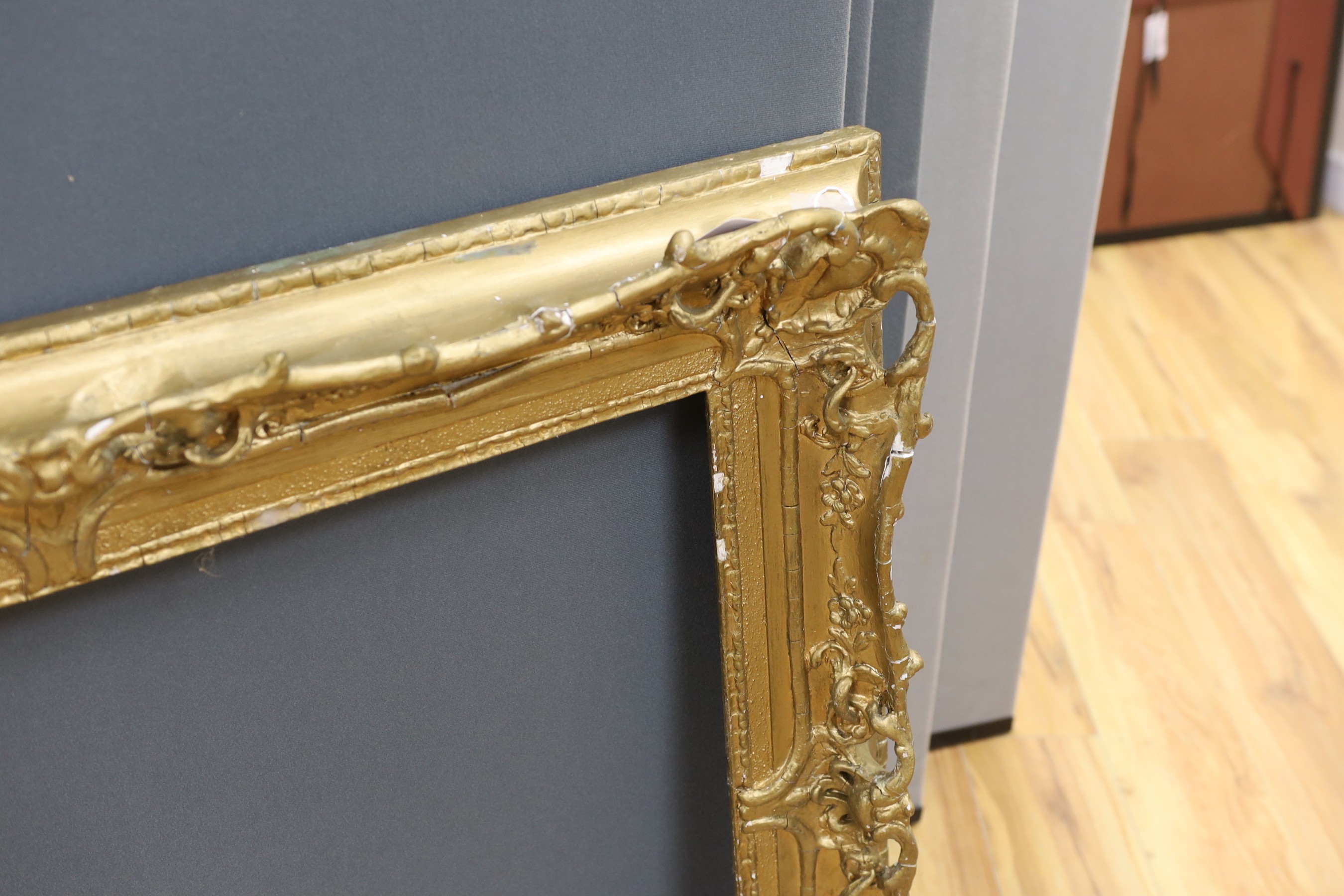 An ornate painted gilt picture frame, 90 x 100cm overall